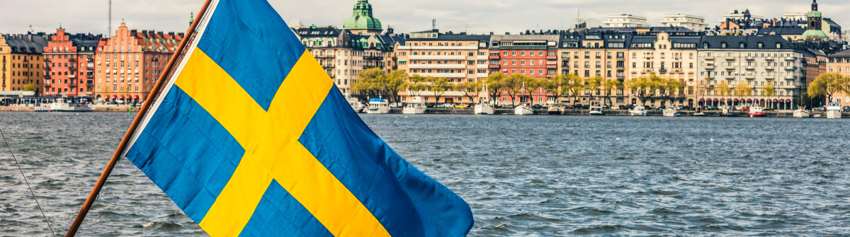 Stockholm view to downtown with a Swedish flag