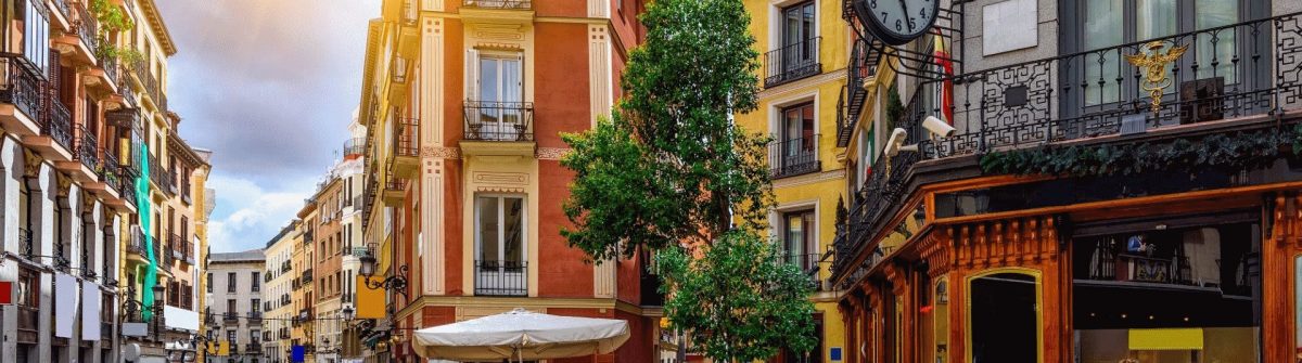 Old-cozy-street-in-Madrid-Spain.-Architecture-and-landmark-of-Madrid-postcard-of-Madrid_566971969