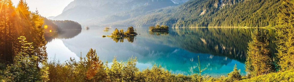 View-of-the-islands-and-turquoise-water-at-Eibsee-Lake-at-the-foot-of-Mt.-Zugspitze-shutterstock_397624216-2
