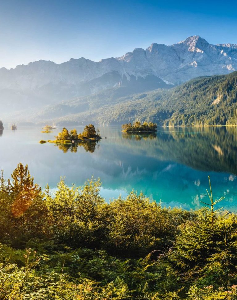 View-of-the-islands-and-turquoise-water-at-Eibsee-Lake-at-the-foot-of-Mt.-Zugspitze-shutterstock_397624216-2